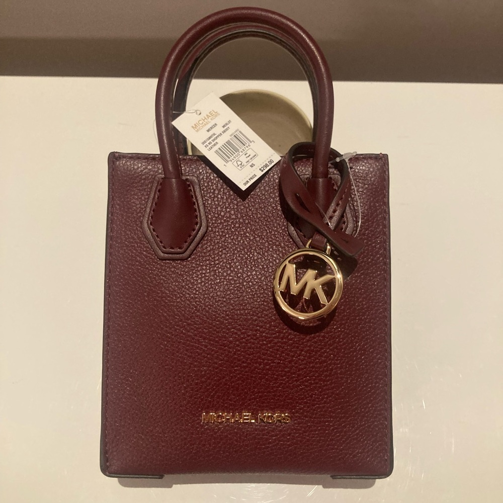 Brand new , small, wine colour leather Michael Kors bag with tag (298$).
